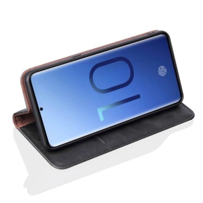 „Deluxe“ atverčiamas juodas odinis Samsung Galaxy S10e (G970) dėklas - knygutė / Priedai.lt